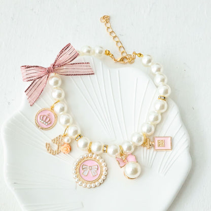 Pink 4-PCS Pearl Charm Pet Necklace - Adjustable Bowknot Collar for Small Dogs & Cats (S: 20+5CM)
